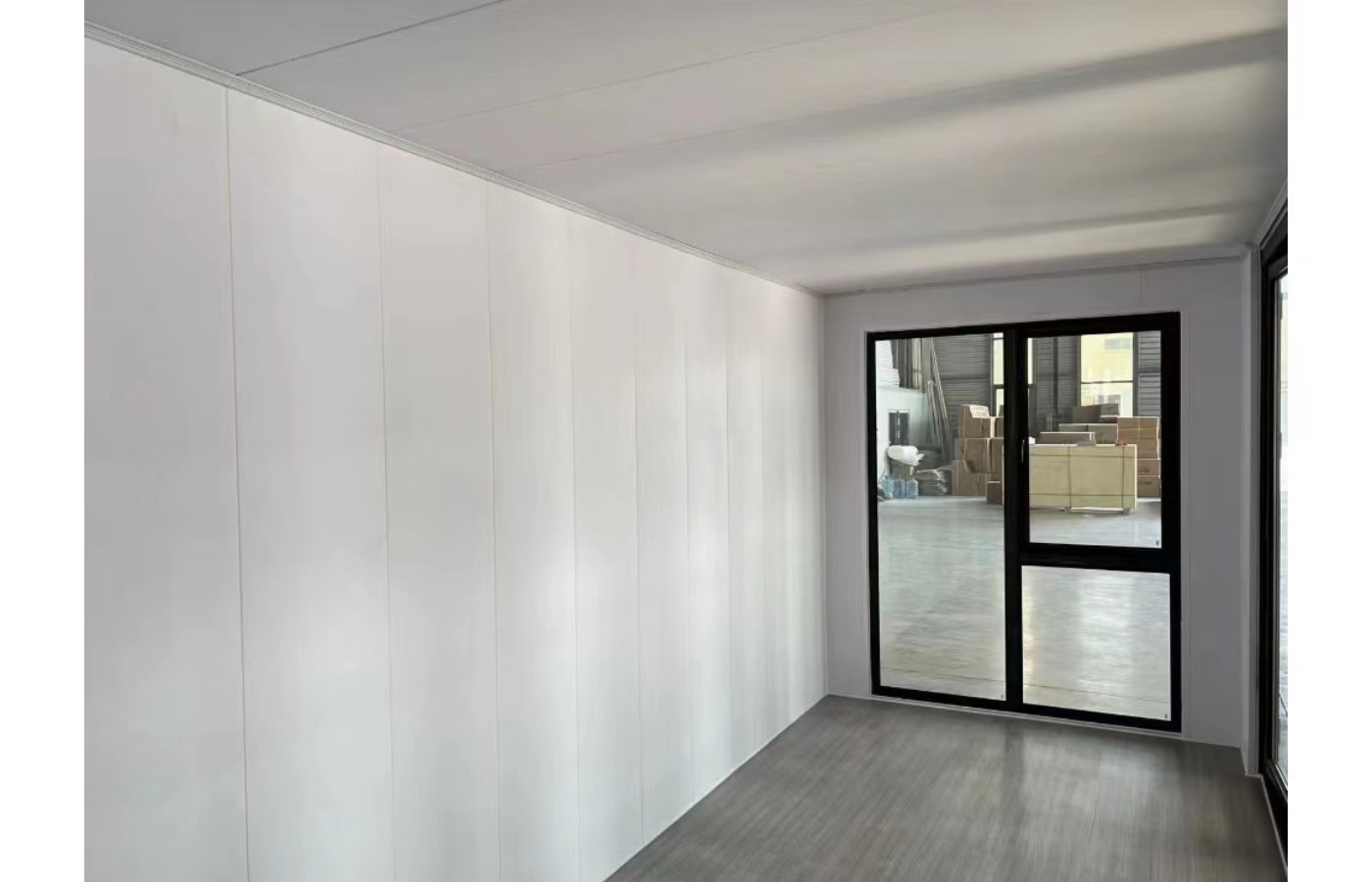 Casa container fissa personalizzata da 20 piedi con finestra dal pavimento al soffitto Casa container fissa personalizzata da 20 piedi con finestra dal pavimento al soffitto