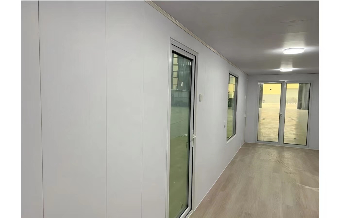 Casa container fissa personalizzata da 20 piedi con finestra dal pavimento al soffitto Casa container fissa personalizzata da 20 piedi con finestra dal pavimento al soffitto